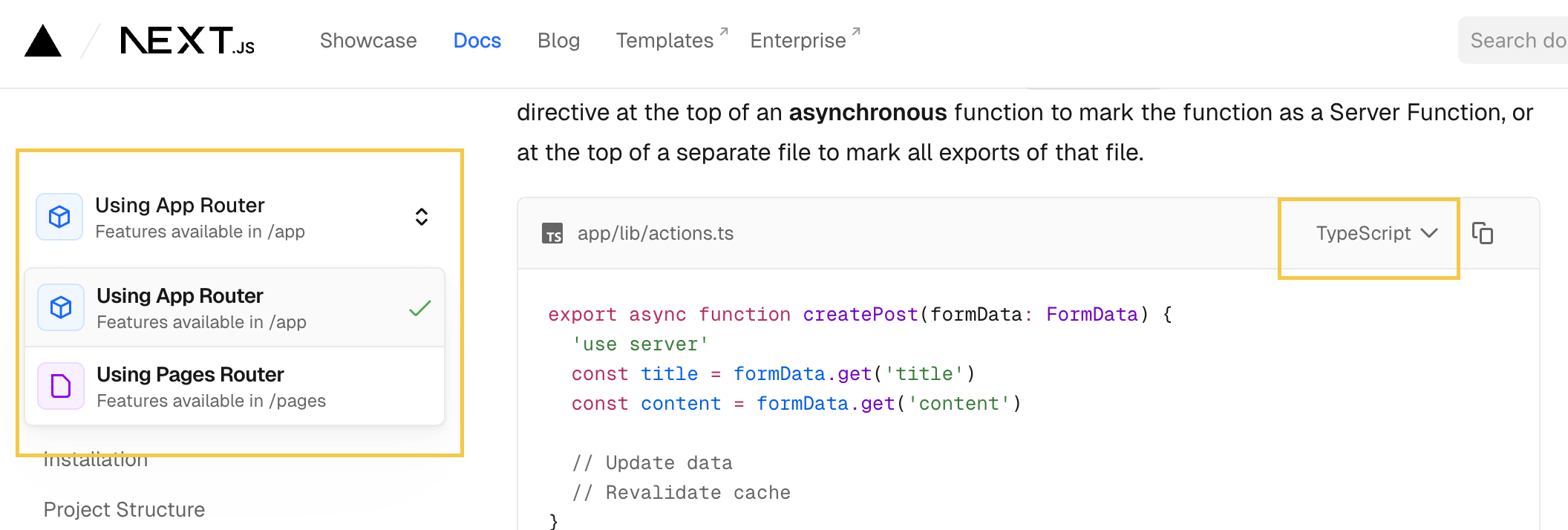 Next.js documentation page with a sidebar dropdown open showing 'Using App Router' and 'Using Pages Router' options, and a code block with a TypeScript language selector tab
